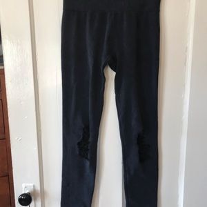 Leggings with “ripped” knee detail